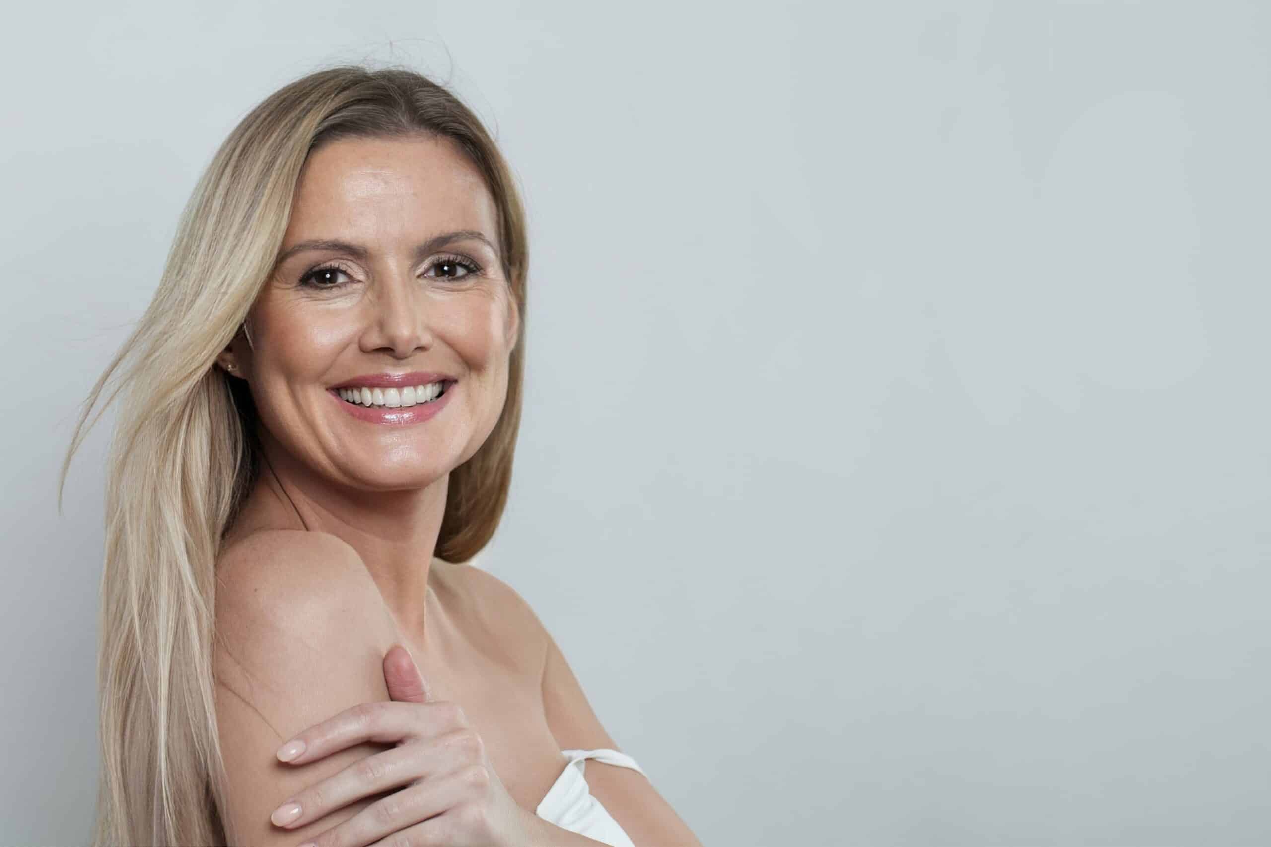 Healthy,Mid,Adult,Woman,Touching,Her,Perfect,Skin.,Beautiful,Portrait